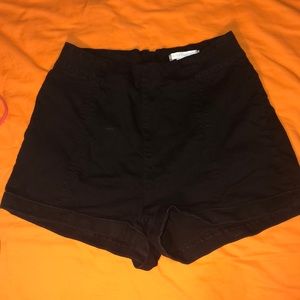 High waisted black shorts with zipper on the back